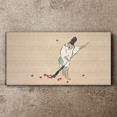 Monk cleaning with leaves Canvas Wall art