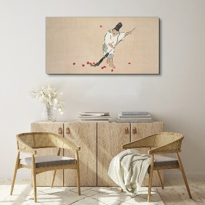 Monk cleaning with leaves Canvas Wall art
