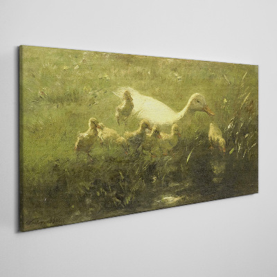 Duck with chicks in the grass Canvas Wall art