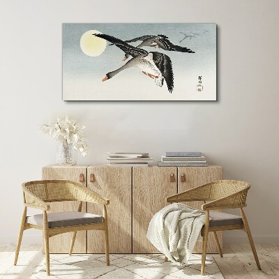 Geese in flight under the full moon Canvas Wall art