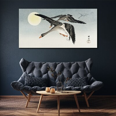 Geese in flight under the full moon Canvas Wall art