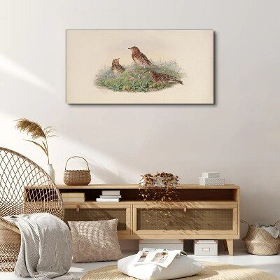 Birds on a background of flowers Canvas print
