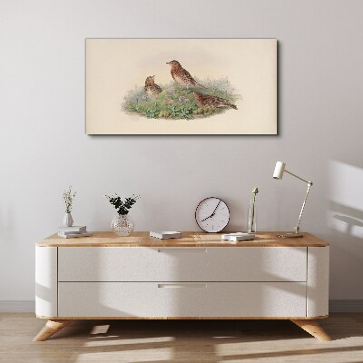 Birds on a background of flowers Canvas print