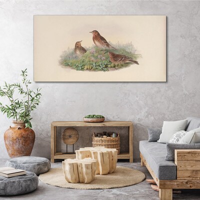 Birds on a background of flowers Canvas print