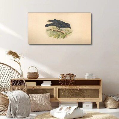 Black bird on a branch Canvas print
