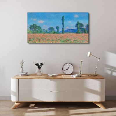 Flower field under blue sky Canvas print