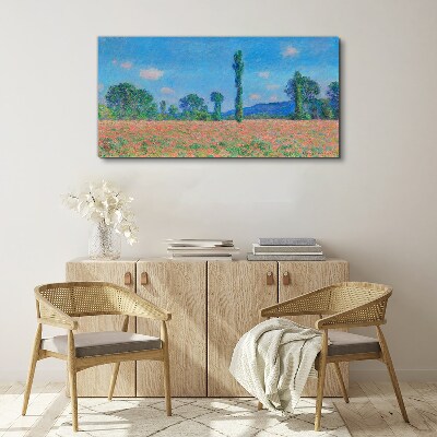 Flower field under blue sky Canvas print