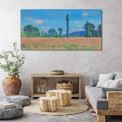 Flower field under blue sky Canvas print