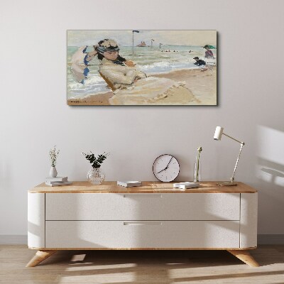 Woman on the beach with an umbrella Canvas print