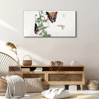 Butterflies on a background of flowers Canvas print