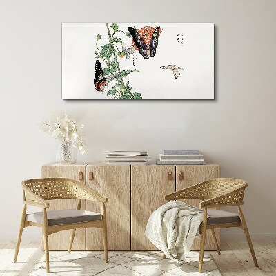 Butterflies on a background of flowers Canvas print
