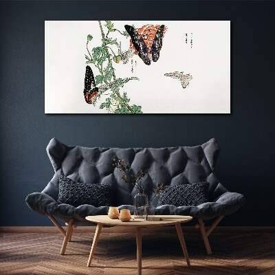 Butterflies on a background of flowers Canvas print