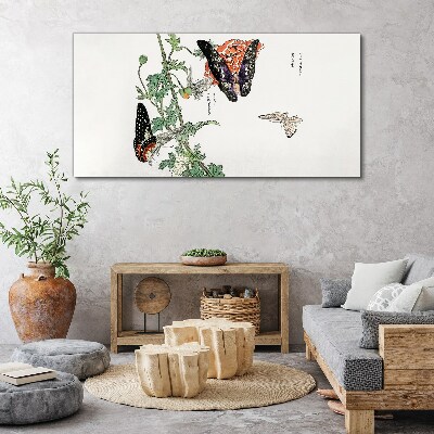 Butterflies on a background of flowers Canvas print