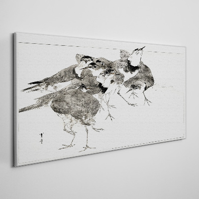 A flock of birds against a white background Canvas print