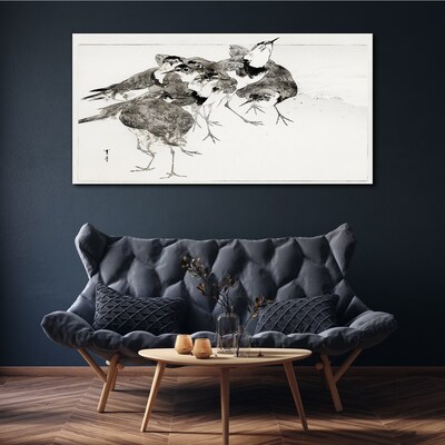 A flock of birds against a white background Canvas print
