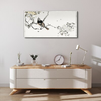 A bird on a branch in delicate colors Canvas print