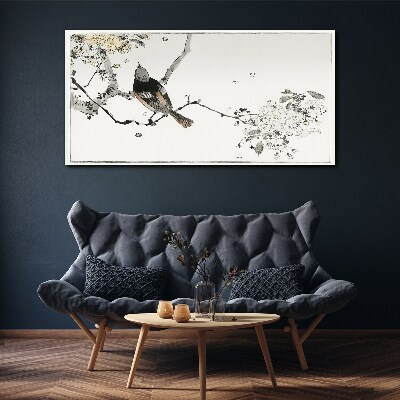 A bird on a branch in delicate colors Canvas print
