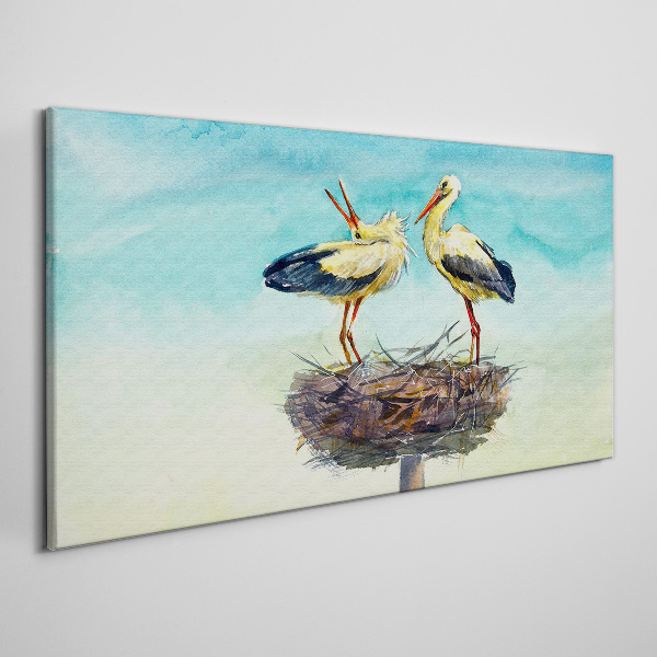 Storks on a nest in the blue Canvas Wall art
