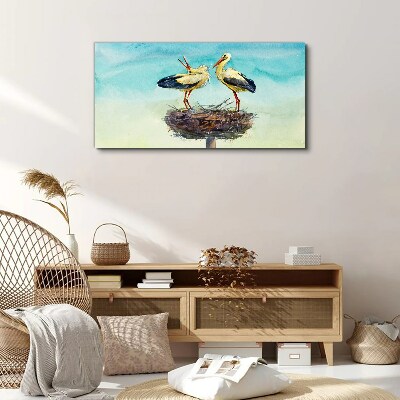 Storks on a nest in the blue Canvas Wall art