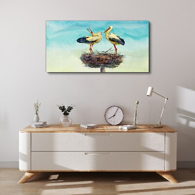 Storks on a nest in the blue Canvas Wall art