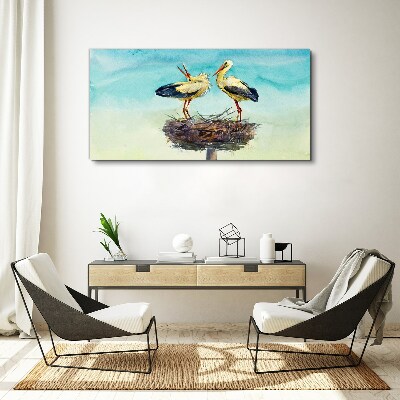 Storks on a nest in the blue Canvas Wall art