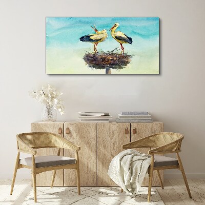 Storks on a nest in the blue Canvas Wall art