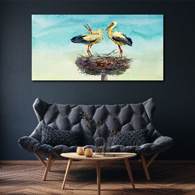 Storks on a nest in the blue Canvas Wall art