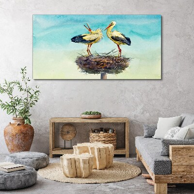 Storks on a nest in the blue Canvas Wall art