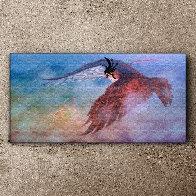 Flight of a bird of prey in the clouds Canvas Wall art