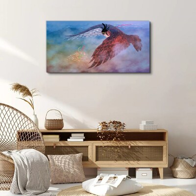 Flight of a bird of prey in the clouds Canvas Wall art