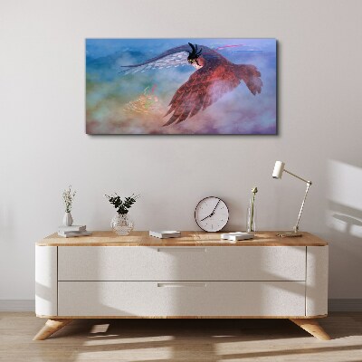 Flight of a bird of prey in the clouds Canvas Wall art