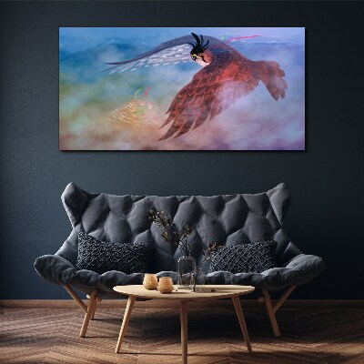 Flight of a bird of prey in the clouds Canvas Wall art