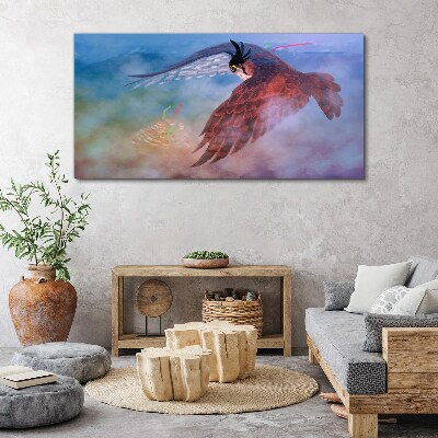Flight of a bird of prey in the clouds Canvas Wall art