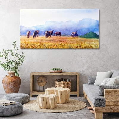 A large herd of horses in the meadow Canvas print