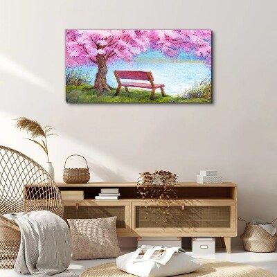 Spring peace under the blossoming cherry tree Canvas print