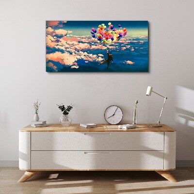 Flight in the clouds with balloons Canvas print