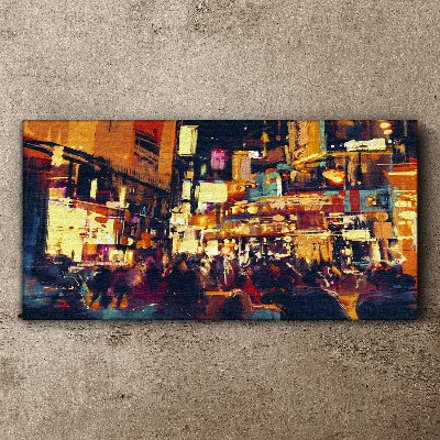 The hustle and bustle of city life at night Canvas print
