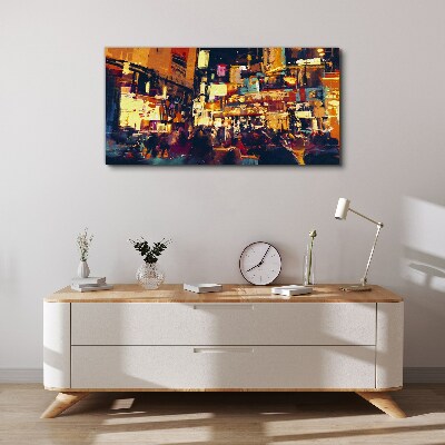The hustle and bustle of city life at night Canvas print