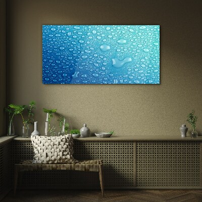 Water drops on a blue background Glass Wall Art