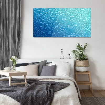 Water drops on a blue background Glass Wall Art