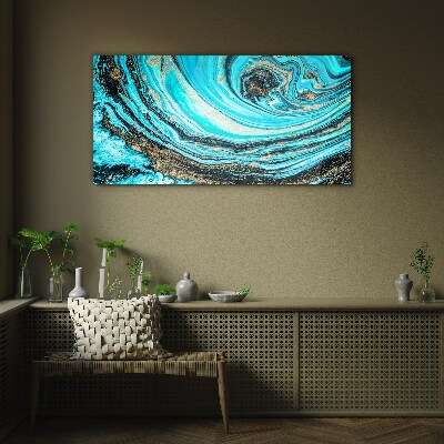 Ocean swirls in blue and gold Glass Wall Art