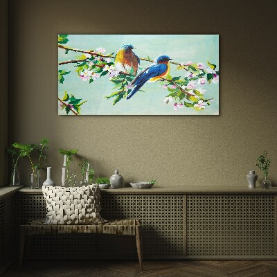Birds on a flowering branch Glass Wall Art