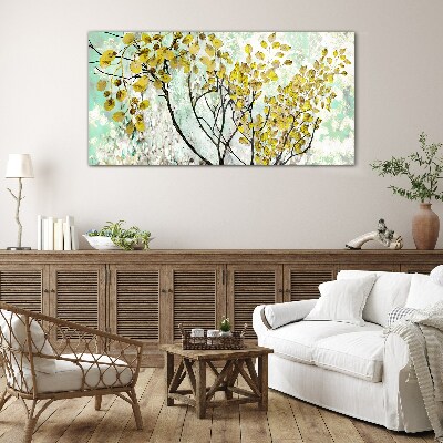 Spring leaves against the blue background Glass Wall Art