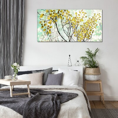 Spring leaves against the blue background Glass Wall Art