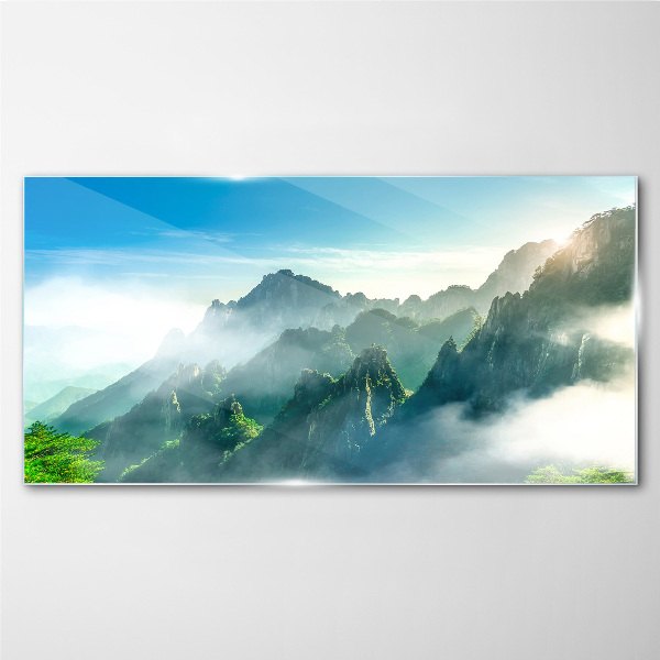 Mountain landscape on a misty morning Glass Wall Art