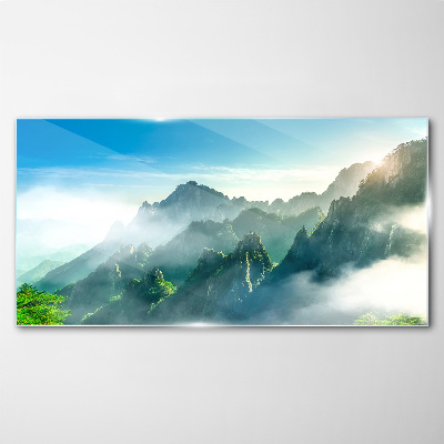 Mountain landscape on a misty morning Glass Wall Art