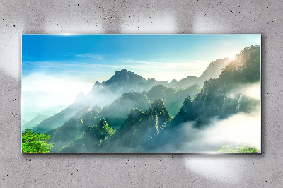 Mountain landscape on a misty morning Glass Wall Art