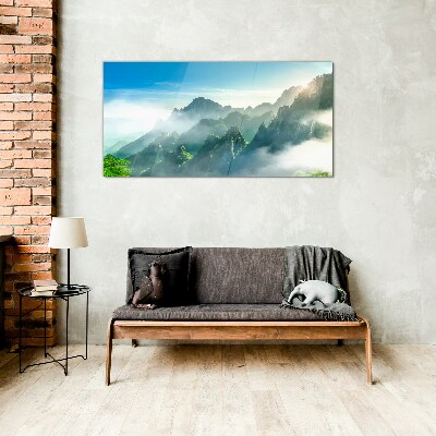 Mountain landscape on a misty morning Glass Wall Art