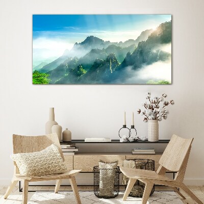 Mountain landscape on a misty morning Glass Wall Art