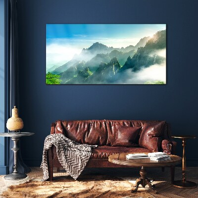 Mountain landscape on a misty morning Glass Wall Art